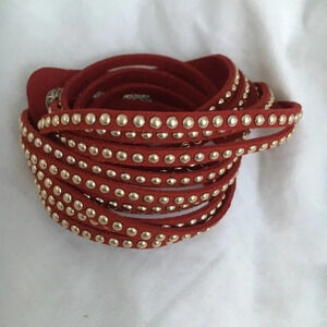 Bracelet red with gold dots